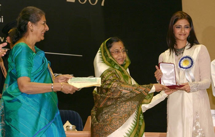 Young actress Sonam Kapoor accepting the award on behalf of dad Anil Kapoor at the 55th National Award ceremony. (Photo: IANS)